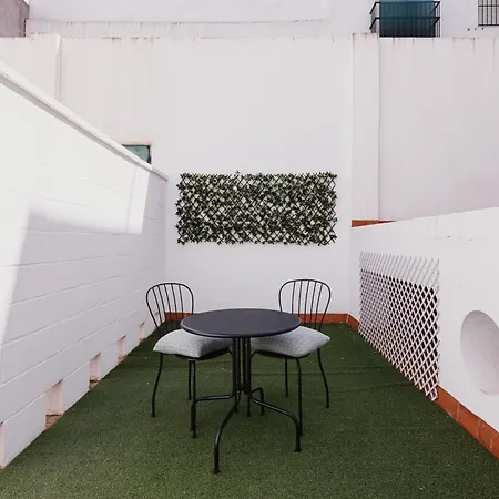 Quiet Terrace In Triana Close To The River Севилья